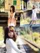 A woman sitting on a train platform next to a train station.