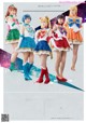 A group of girls dressed in sailor moon costumes posing for a poster.